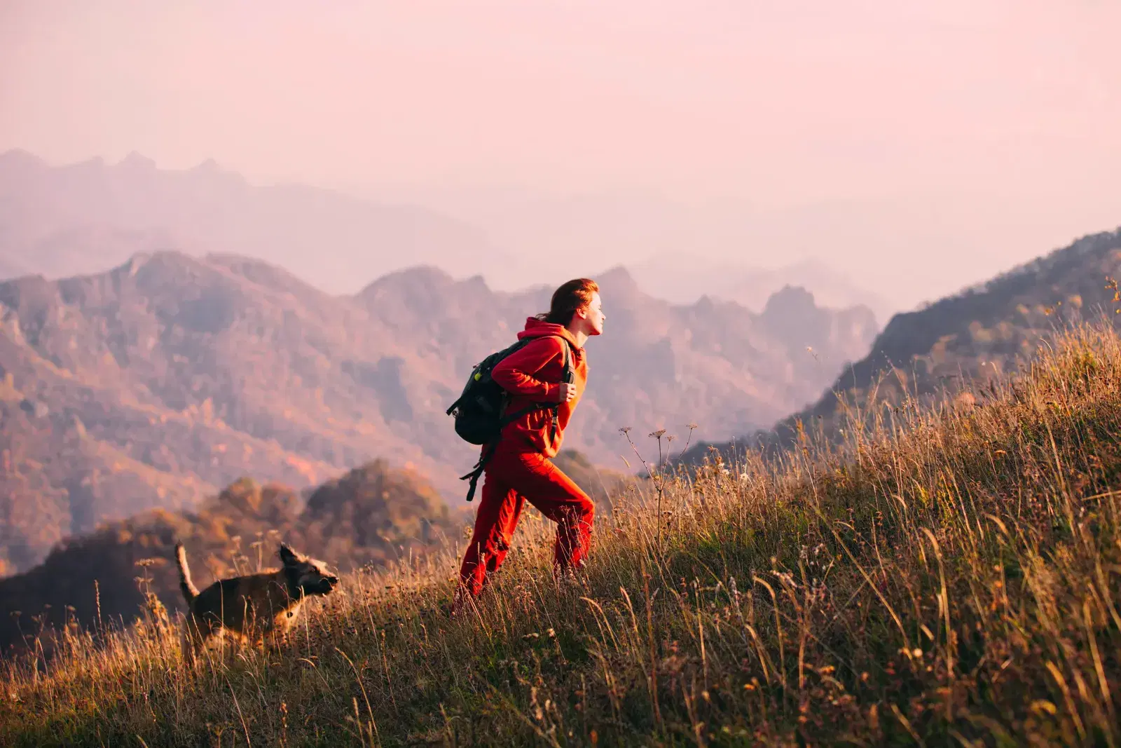 Hiker looking out over a mountain range